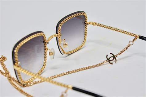 chanel chain sunglasses 2013|Chanel sunglasses with on top.